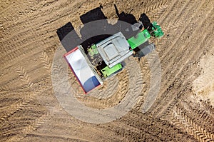 Tractor spraying the fertilizers on the field