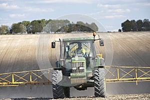 Tractor Spraying Field