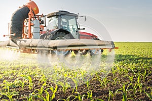 Tractor spraying pesticides