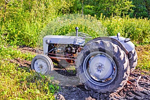 Tractor is stuck in the mud dirt in Vang Norway