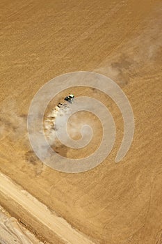 Tractor tilling the soil