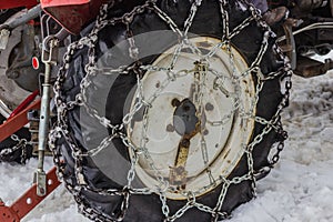 A tractor tire with snow chain