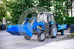 tractor with trailer for cleaning park territories