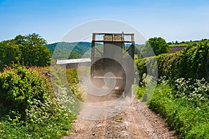 Tractor with trailer on rural road