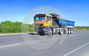 A Tractor Trailer Truck with tipper semi-trailer o