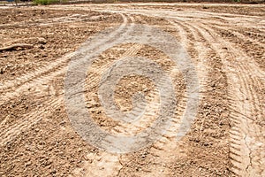Tractor tyre tracks on the ground