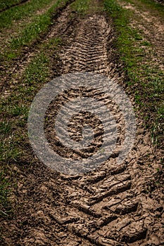 Tractor wheel tracks on the ground