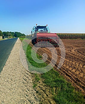 Tractor work the land on a farm