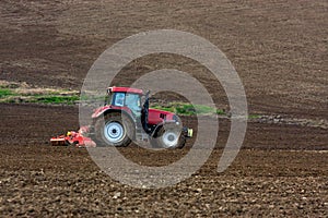 Tractor working on field