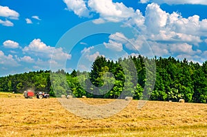 Tractor working in field