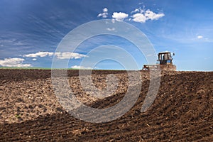 Tractor working on the field