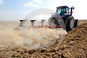 Tractor working at the field