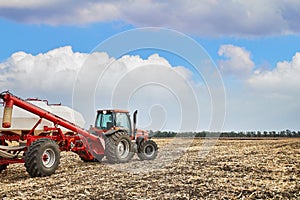 Tractor working in field