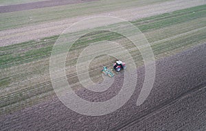 Tractor working in field