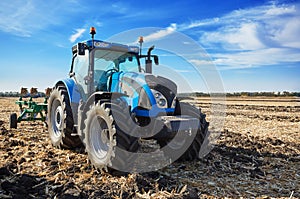 Tractor working in field