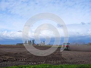 Tractor working in field