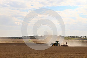 tractor working on the field harvesting