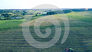 Tractor working in fields aerial view