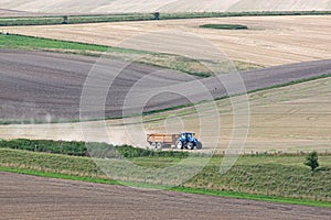 Tractor working Fields of the Pewsey Vale, Wiltshire