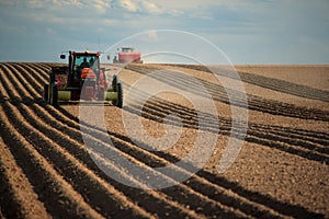 Planting potatoes in an Idaho farm field.