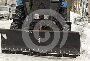 Tractors automatic snow removal