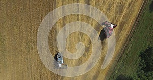 Tractors on harvest field