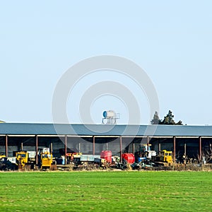 Tractors and other equipment under the awning in