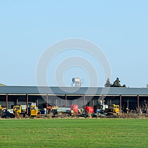 Tractors and other equipment under the awning