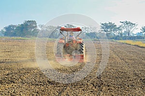 Tractors planting farm field