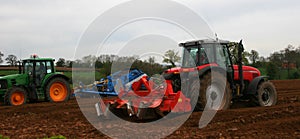 Tractors ploughing