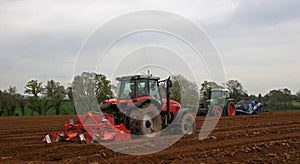 Tractors ploughing