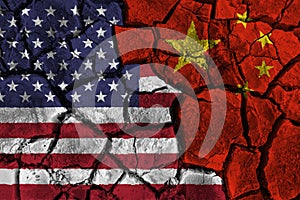 Trade war between United states of america VS China . flag on cracked wall background . Confliction and crisis concept .