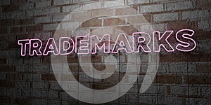 TRADEMARKS - Glowing Neon Sign on stonework wall - 3D rendered royalty free stock illustration