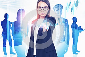 Trader in glasses and her team, financial chart