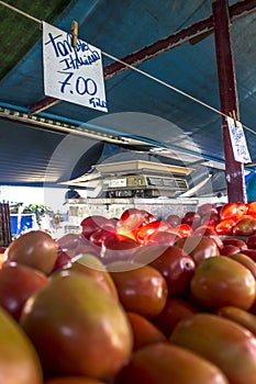 Traders sell fresh tomatoes as retail sales to consumers on street market in Sao Paulo