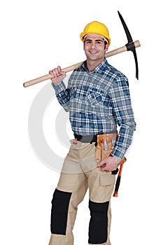 Tradesman holding a pickax