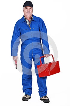 Tradesman holding a toolbox