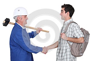 Tradesman meeting new apprentice