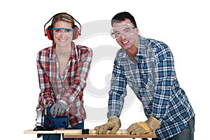 Tradesman training his apprentice