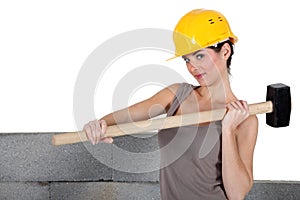 Tradeswoman holding a mallet