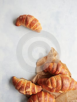 tradicional artisan croissants on wrapping paper