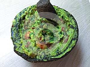 Guacamole in a stone molcajete