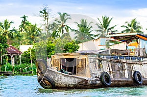 Trading boat by Can Tho on floating market in Vietnam