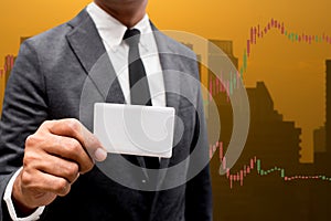 Trading Businessman hold blank credit card.and Forex Trading Lin