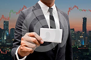 Trading Businessman hold blank credit card.and Forex Trading Lin