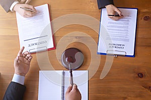 Trading documents and joint venture documents are brought to the investors to sign together within the legal counsel's office
