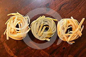 Italian pasta tagliatelle paglia e fieno photo