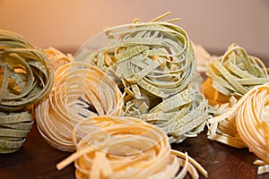 Italian pasta tagliatelle paglia e fieno photo