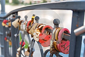 The tradition of newlyweds to hang locks on the railing