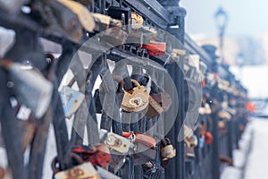 The tradition of newlyweds to hang locks on the railing